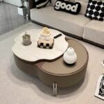 MODERN ORGANIC SHAPED CENTER TABLE WITH MARBLE TOP AND LEATHER ACCENT BASE