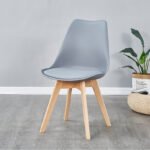 INSPIRED CONTEMPORARY DINING CHAIR WITH ERGONOMIC CURVED SEAT AND NATURAL WOOD LEGS