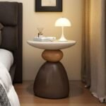 SCULPTED PEDESTAL SIDE TABLE WITH DUAL-TONE BALANCED BASE