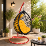 BLACK WOVEN RATTAN HANGING CHAIR WITH VIBRANT AMBER CUSHION