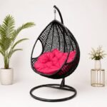 OPEN WEAVE RATTAN SWING CHAIR WITH TUFTED SEAT CUSHION