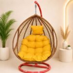 BOHO WOVEN RATTAN EGG CHAIR WITH VIBRANT SUNBURST CUSHIONS