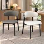 MODERN FAUX-LEATHER CRESCENT CHAIR WITH MATTE BLACK LEGS